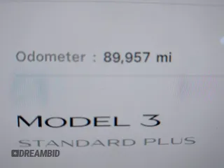 2020 Tesla Model 3 Standard Range Plus with VIN 5YJ3E1EA0LF597761, listed as a IAAI auction lot 41773918 with 89,957 mi miles. Bid and sale history available at carsss.com. Image 14.
