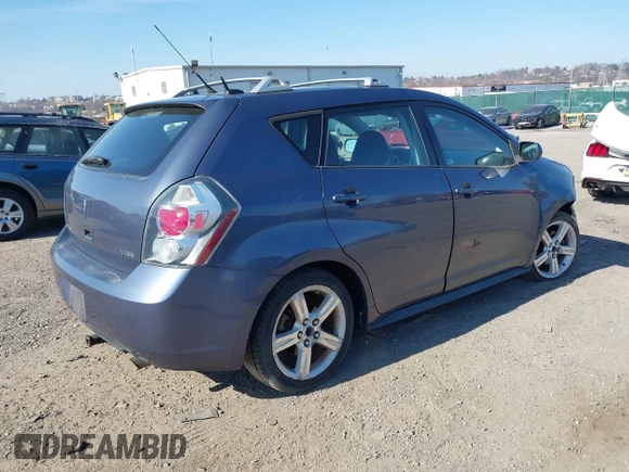 2009 Pontiac Vibe w/1SB with VIN 5Y2SL67059Z423173, listed as a IAAI auction lot 41779483 with 108,896 mi miles. Bid and sale history available at carsss.com. Image 4.