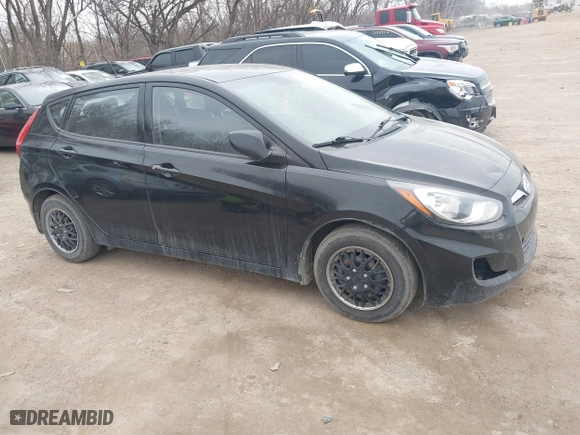 2014 Hyundai Accent GS with VIN KMHCT5AE6EU197814, listed as a IAAI auction lot 41697539 with 228,490 mi miles. Bid and sale history available at carsss.com. Image 1.