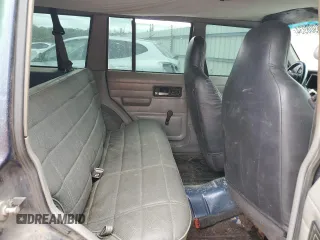 1996 Jeep Cherokee SE with VIN 1J4FT28S5TL244548, listed as a Copart auction lot 68908934 with 182,507 mi miles and Salvage Title. Bid and sale history available at carsss.com. Image 11.