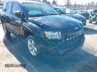 2011 Jeep Compass with VIN 1J4NF1FB6BD180447, listed as a IAAI auction lot 41575014 with 130,694 mi miles. Bid and sale history available at carsss.com. Image 6.