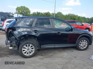 2016 Mazda CX-5 Touring with VIN JM3KE2CY5G0653108, listed as a IAAI auction lot 37717249 with 90,704 mi miles and . Bid and sale history available at DreamBid. Image 14.