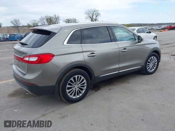 2016 Lincoln MKX Select z VIN 2LMTJ8KR9GBL57397, wystawiony jako IAAI lot #42104585 z przebiegiem 286 562 mil mil oraz . Historia ofert i sprzedaży dostępna na DreamBid. Obrazek 4.