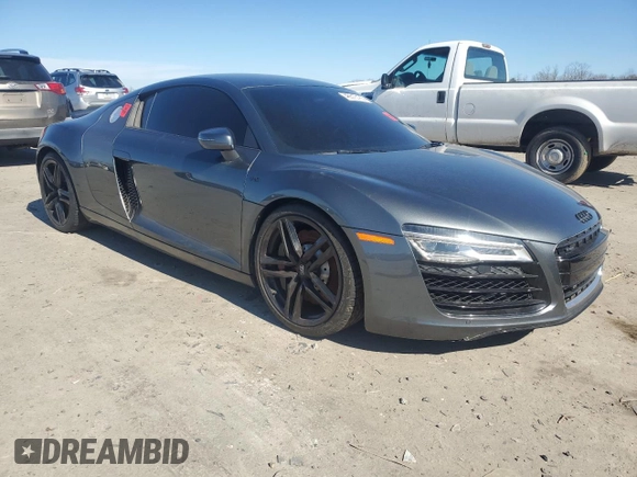 2014 Audi R8 z VIN WUAAUAFG0EN000936, wystawiony jako Copart lot #46513185 z przebiegiem Nie podano mil oraz Szkoda całkowita • Salvage title. Historia ofert i sprzedaży dostępna na DreamBid. Obrazek 4.