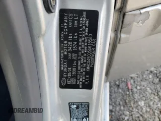 2005 Hyundai Accent GLS with VIN KMHCG45C05U618580, listed as a Copart auction lot 79239064 with 54,228 mi miles and Salvage Title. Bid and sale history available at carsss.com. Image 12.