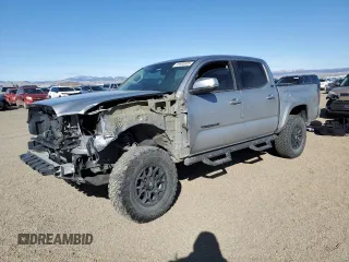 2020 Toyota Tacoma SR5 z VIN 3TMCZ5AN7LM311047, wystawiony jako Copart lot #49690855 z przebiegiem 48 089 mil mil oraz Szkoda całkowita • Salvage title. Historia ofert i sprzedaży dostępna na DreamBid. Obrazek 1.