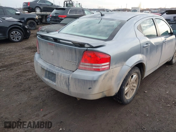 2009 Dodge Avenger SXT with VIN 1B3LC56B09N522736, listed as a IAAI auction lot 41195477 with 100,977 mi miles and . Bid and sale history available at DreamBid. Image 4.