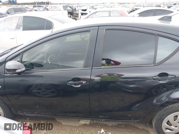 2016 Toyota Prius One z VIN JTDKDTB34G1125061, wystawiony jako IAAI lot #41866419 z przebiegiem 50 617 mil mil oraz . Historia ofert i sprzedaży dostępna na DreamBid. Obrazek 14.