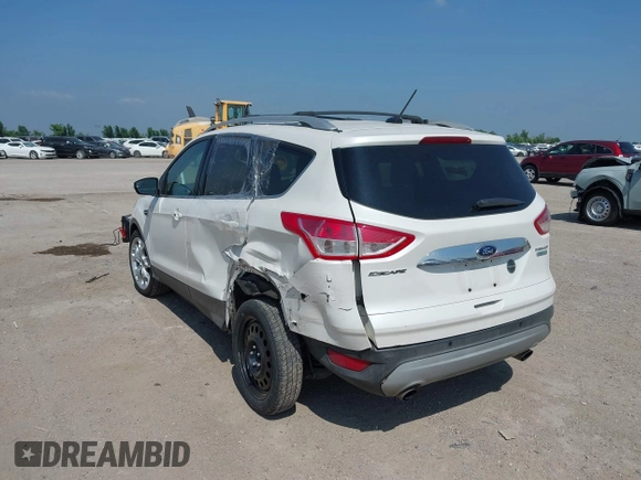 2015 Ford Escape Titanium with VIN 1FMCU0JX4FUB07322, listed as a IAAI auction lot 42220345 with 184,852 mi miles and . Bid and sale history available at DreamBid. Image 3.