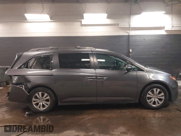 2016 Honda Odyssey EX-L with VIN 5FNRL5H61GB138100, listed as a IAAI auction lot 41548666 with 127,780 mi miles. Bid and sale history available at carsss.com. Image 13.