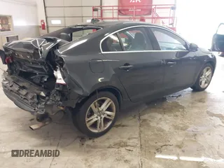2015 Volvo S60 T5 Drive-E Premier Plus with VIN YV126MFC6F1313759, listed as a IAAI auction lot 41748305 with 43,491 mi miles and . Bid and sale history available at DreamBid. Image 4.