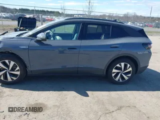 2023 Volkswagen ID.4 Pro with VIN 1V2CMPE89PC013880, listed as a IAAI auction lot 41801156 with 18,098 mi miles and . Bid and sale history available at DreamBid. Image 14.