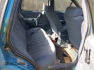 1992 Ford Tempo z VIN 1FAPP36U6NK188935, wystawiony jako IAAI lot #42133598 z przebiegiem 31 673 mil mil oraz . Historia ofert i sprzedaży dostępna na DreamBid. Obrazek 8.
