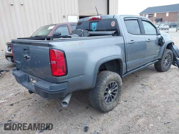 2018 Chevrolet Colorado 4WD ZR2 with VIN 1GCPTEE12J1297871, listed as a IAAI auction lot 41816842 with 101,872 mi miles. Bid and sale history available at carsss.com. Image 4.