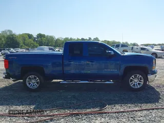 2015 Chevrolet Silverado 1500 LT with VIN 1GCVKREC8FZ213225, listed as a IAAI auction lot 42069659 with 201,171 mi miles. Bid and sale history available at carsss.com. Image 13.