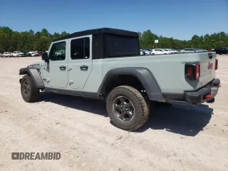 2023 Jeep Gladiator Rubicon с VIN 1C6JJTBG2PL542178, выставлен на аукционе Copart как лот 54684915 с пробегом 24 687 миль миль и Списание • Salvage title. История ставок и продаж доступна на DreamBid. Изображение 2.