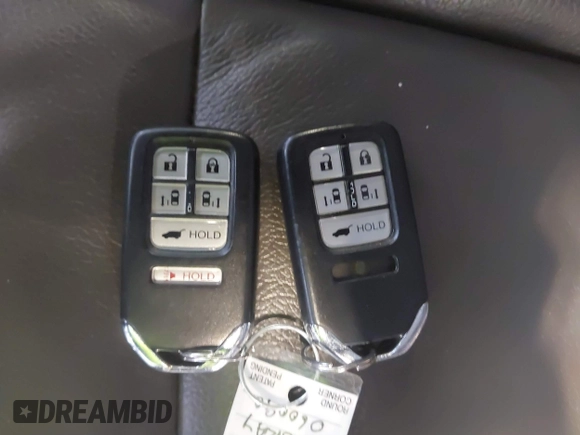 2014 Honda Odyssey EX-L with VIN 5FNRL5H6XEB060090, listed as a IAAI auction lot 41625571 with 112,762 mi miles and . Bid and sale history available at carsss.com. Image 11.