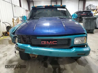 1994 GMC Sonoma with VIN 1GTCS1441RK520655, listed as a Copart auction lot 49956605 with 109,399 mi miles and Salvage Title. Bid and sale history available at DreamBid. Image 5.