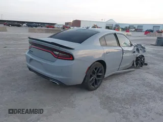 2022 Dodge Charger SXT with VIN 2C3CDXBG3NH122797, listed as a IAAI auction lot 41900036 with 60,093 mi miles and . Bid and sale history available at DreamBid. Image 4.
