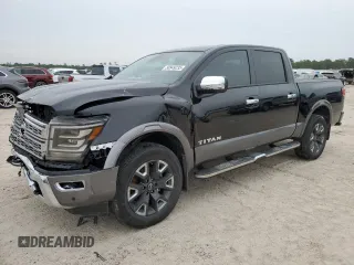 2023 Nissan Titan Platinum Reserve with VIN 1N6AA1ED5PN117960, listed as a Copart auction lot 50949235 with 19,754 mi miles and Salvage title. Bid and sale history available at DreamBid. Image 1.