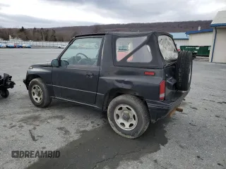 1993 Geo Tracker z VIN 2CNBE18U6P6927170, wystawiony jako Copart lot #48283925 z przebiegiem 178 293 mil mil oraz Tytuł czysty. Historia ofert i sprzedaży dostępna na DreamBid. Obrazek 2.