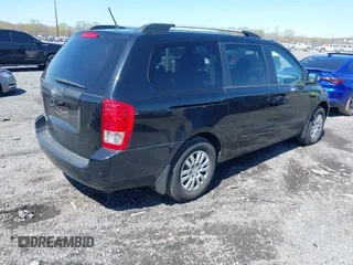 2014 Kia Sedona LX with VIN KNDMG4C71E6579260, listed as a IAAI auction lot 41985403 with 93,523 mi miles. Bid and sale history available at carsss.com. Image 4.