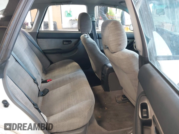 2000 Subaru Legacy L with VIN 4S3BE6352Y7213443, listed as a IAAI auction lot 42019409 with 208,785 mi miles and . Bid and sale history available at DreamBid. Image 8.