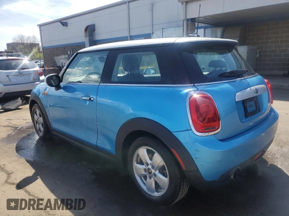 2015 MINI Hardtop with VIN WMWXM5C51FT941503, listed as a Copart auction lot 52903145 with 92,425 mi miles and Salvage Title. Bid and sale history available at DreamBid. Image 2.