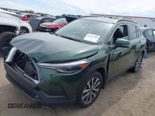 2023 Toyota Corolla Cross XLE with VIN 7MUEAAAG9PV053569, listed as a IAAI auction lot 42319709 with 71,105 mi miles and . Bid and sale history available at DreamBid. Image 16.