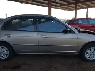 2003 Honda Civic LX with VIN 2HGES16673H537693, listed as a IAAI auction lot 41696832 with 173,842 mi miles. Bid and sale history available at carsss.com. Image 13.