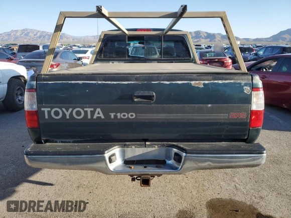 1996 Toyota T100 SR5 z VIN JT4UN24D2T0029466, wystawiony jako Copart lot #57122945 z przebiegiem 421 207 mil mil oraz Szkoda całkowita • Salvage title. Historia ofert i sprzedaży dostępna na DreamBid. Obrazek 6.