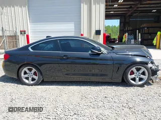 2016 BMW 4 Series 428i with VIN WBA3N7C55GK227677, listed as a IAAI auction lot 42048025 with 82,078 mi miles and . Bid and sale history available at carsss.com. Image 13.