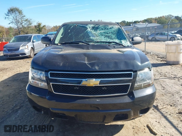 2013 Chevrolet Tahoe Commercial with VIN 1GNLC2E05DR266048, listed as a IAAI auction lot 40848505 with 95,459 mi miles and . Bid and sale history available at DreamBid. Image 12.