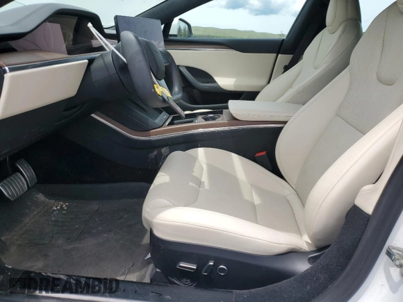 2022 Tesla Model S z VIN 5YJSA1E57NF487187, wystawiony jako Copart lot #58295845 z przebiegiem 50 879 mil mil oraz Szkoda całkowita • Salvage title. Historia ofert i sprzedaży dostępna na DreamBid. Obrazek 7.