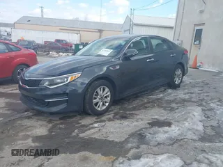 2016 Kia Optima LX z VIN 5XXGT4L34GG020666, wystawiony jako IAAI lot #41406265 z przebiegiem 173 645 mil mil oraz . Historia ofert i sprzedaży dostępna na DreamBid. Obrazek 2.