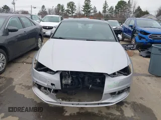 2015 Audi A3 Premium Plus z VIN WAUCCGFFXF1020409, wystawiony jako IAAI lot #41534468 z przebiegiem 116 708 mil mil oraz . Historia ofert i sprzedaży dostępna na DreamBid. Obrazek 13.