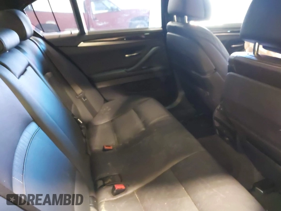 2014 BMW 5 Series 535i with VIN WBA5B1C57ED480208, listed as a IAAI auction lot 41257404 with 114,340 mi miles and . Bid and sale history available at DreamBid. Image 8.