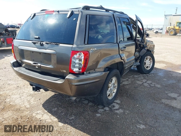 1999 Jeep Grand Cherokee Limited with VIN 1J4GW68N5XC773100, listed as a IAAI auction lot 41998432 with Not provided miles and . Bid and sale history available at DreamBid. Image 4.