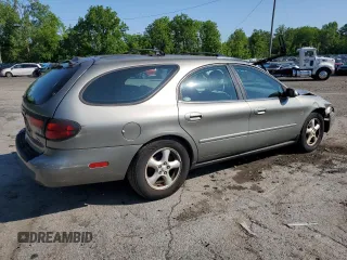 2004 Ford Taurus SE with VIN 1FAFP58S44A108250, listed as a Copart auction lot 58520615 with 119,575 mi miles and Salvage title. Bid and sale history available at DreamBid. Image 3.