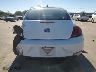 2012 Volkswagen Beetle 2.5L with VIN 3VWJX7AT0CM659261, listed as a Copart auction lot 79513824 with 144,537 mi miles and Salvage Title. Bid and sale history available at carsss.com. Image 6.