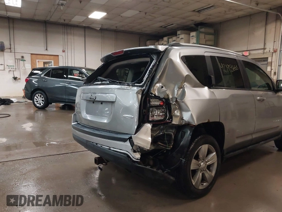 2016 Jeep Compass Latitude with VIN 1C4NJDEB4GD631759, listed as a IAAI auction lot 42193660 with 100,659 mi miles and . Bid and sale history available at DreamBid. Image 6.