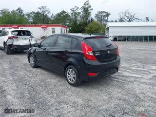 2014 Hyundai Accent GS with VIN KMHCT5AE7EU164658, listed as a IAAI auction lot 41911092 with 132,442 mi miles. Bid and sale history available at carsss.com. Image 3.