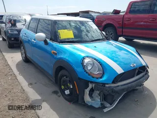 2017 MINI Hardtop 4 Door Cooper with VIN WMWXU1C53H2E17614, listed as a IAAI auction lot 41686204 with 53,409 mi miles and . Bid and sale history available at DreamBid. Image 1.