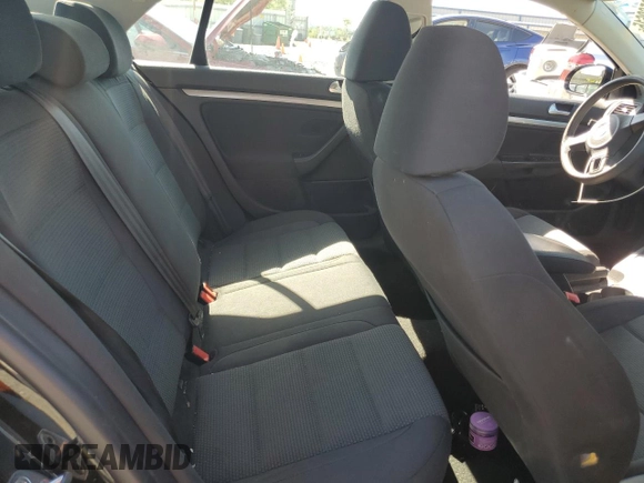 2010 Volkswagen Jetta S with VIN 3VWJZ7AJ1AM032185, listed as a Copart auction lot 58562615 with 189,752 mi miles and Salvage title. Bid and sale history available at DreamBid. Image 10.