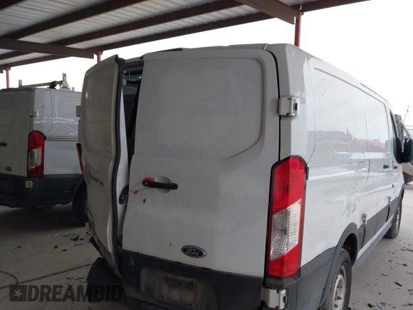 2019 Ford Transit with VIN 1FTYE1ZM2KKB46391, listed as a IAAI auction lot 41362328 with 128,327 mi miles and . Bid and sale history available at carsss.com. Image 4.
