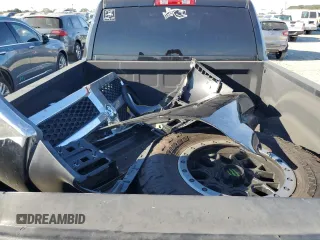 2018 Ram 1500 Tradesman z VIN 1C6RR7ST7JS102633, wystawiony jako Copart lot #72438884 z przebiegiem 84 725 mil mil oraz Szkoda całkowita • Salvage title. Historia ofert i sprzedaży dostępna na DreamBid. Obrazek 12.