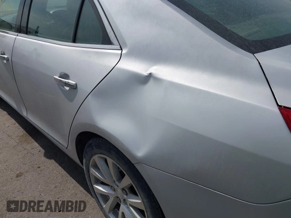 2013 Chevrolet Malibu LTZ with VIN 1G11H5SA3DF248223, listed as a IAAI auction lot 42098114 with 186,131 mi miles and . Bid and sale history available at DreamBid. Image 13.