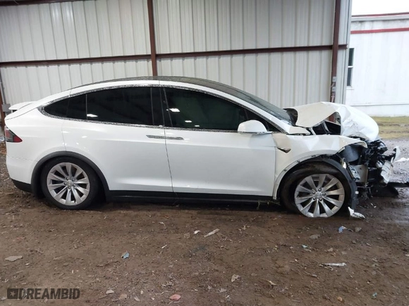 2018 Tesla Model X 75D with VIN 5YJXCBE24JF138297, listed as a IAAI auction lot 41058224 with NaN miles. Bid and sale history available at carsss.com. Image 13.