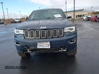 2019 Jeep Grand Cherokee Overland with VIN 1C4RJFCG6KC726690, listed as a IAAI auction lot 41421299 with 116,190 mi miles. Bid and sale history available at carsss.com. Image 13.