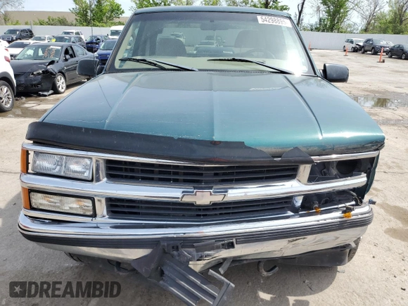 1998 Chevrolet Silverado 1500 with VIN 2GCEK19R4W1143733, listed as a Copart auction lot 54298895 with 210,091 mi miles and Salvage Title. Bid and sale history available at DreamBid. Image 5.